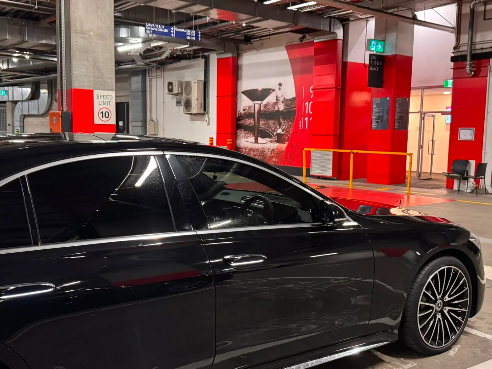 Luxury summer chauffeur transfers in Melbourne — Mercedes-Benz S-Class with skyline view